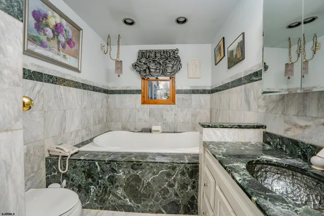 a view of a playground with large trees