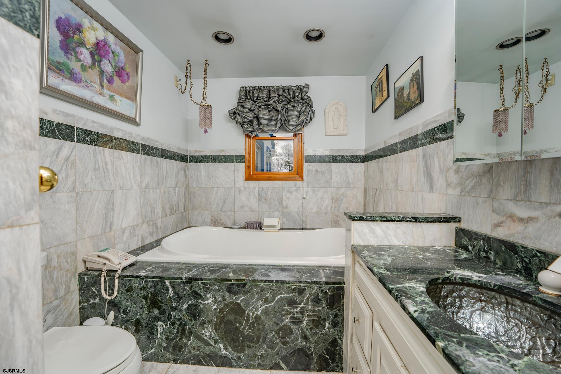 953 Chestnut Avenue Sewell, NJ 08080 - Photo 31 of 76 a bathroom with a granite countertop sink a toilet and a shower