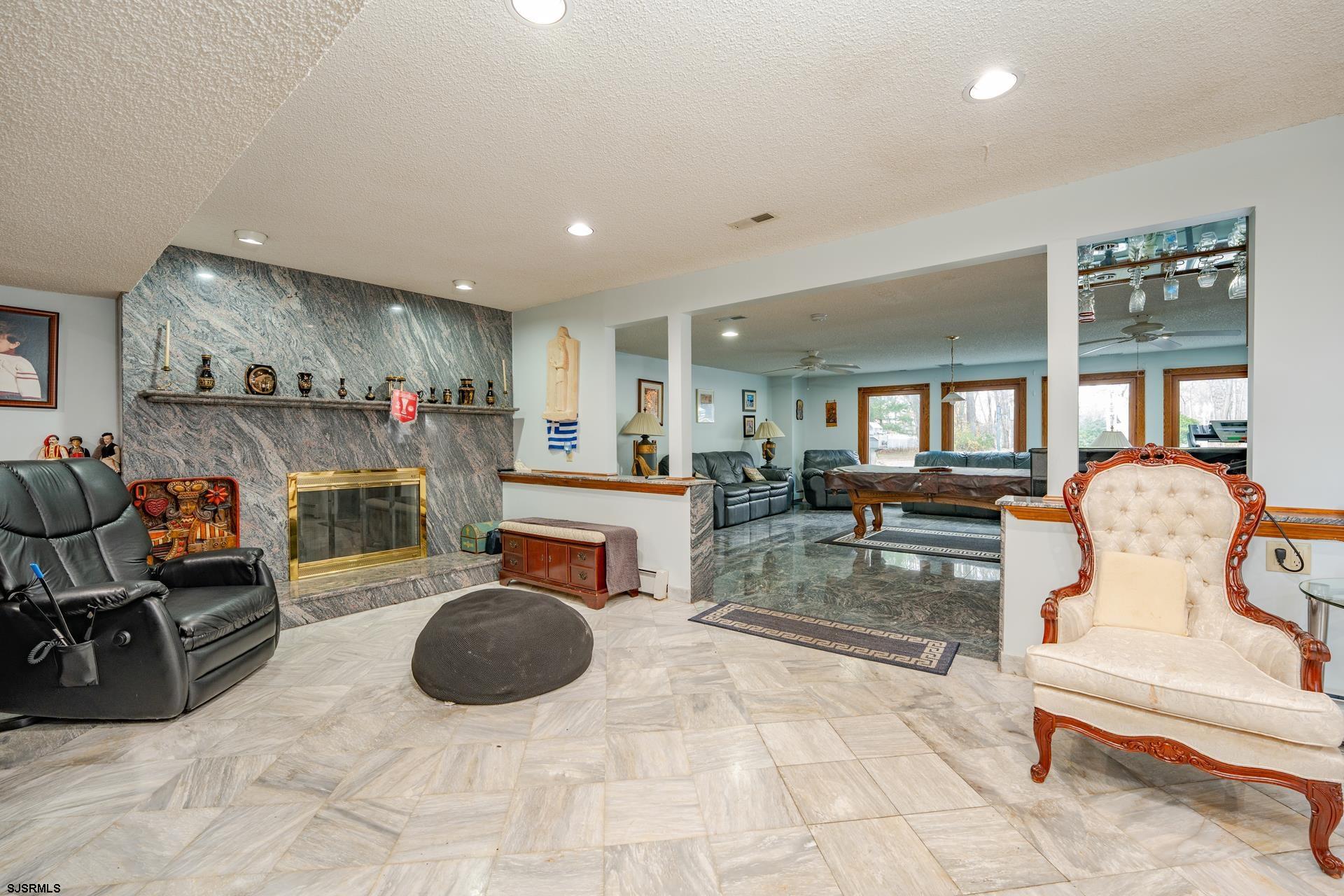 953 Chestnut Avenue Sewell, NJ 08080 - Photo 4 of 76 a view of a room with gym equipment