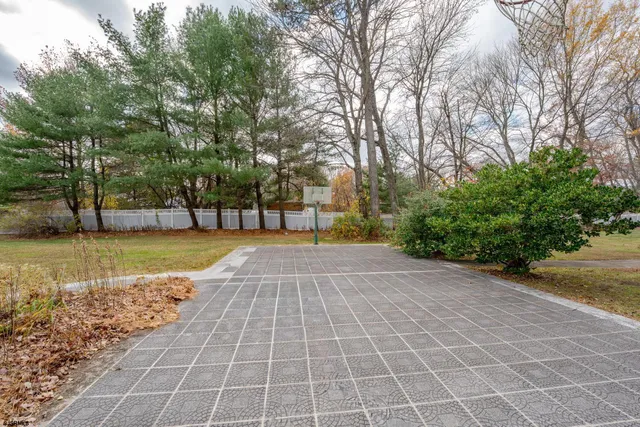 a room with furniture and a rug