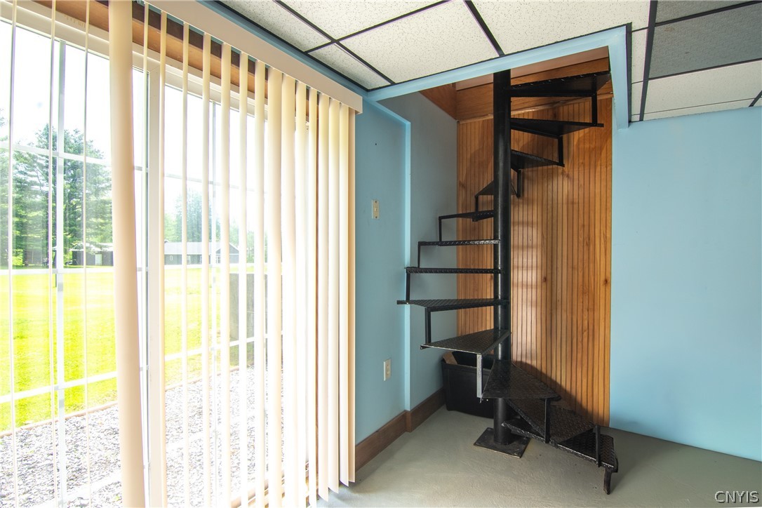 28 Hawthorne Road Schroeppel, NY 13069 - Photo 29 of 34 Spiral staircase going to basement