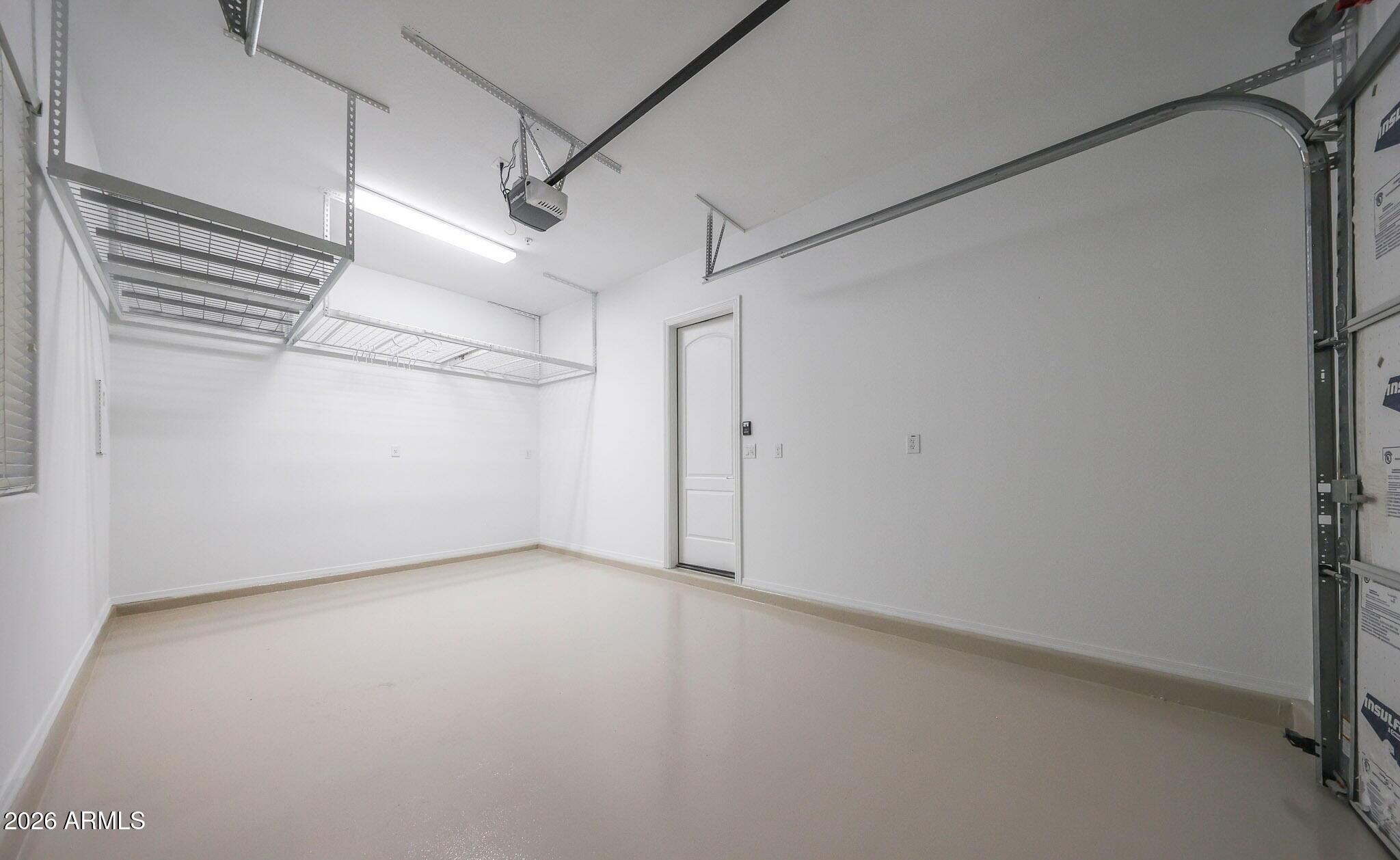 1732 West Gambit Trail Phoenix, AZ 85085 - Photo 41 of 61 Split Garage - epoxy and storage