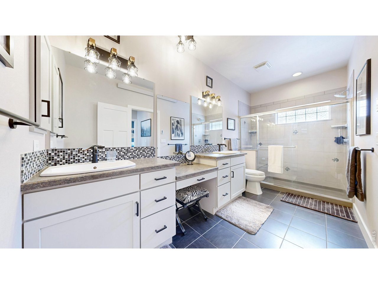 296 Elkridge Road Red Feather Lakes, CO 80545 - Photo 15 of 47 Spa like shared main floor bathroom w/double sinks