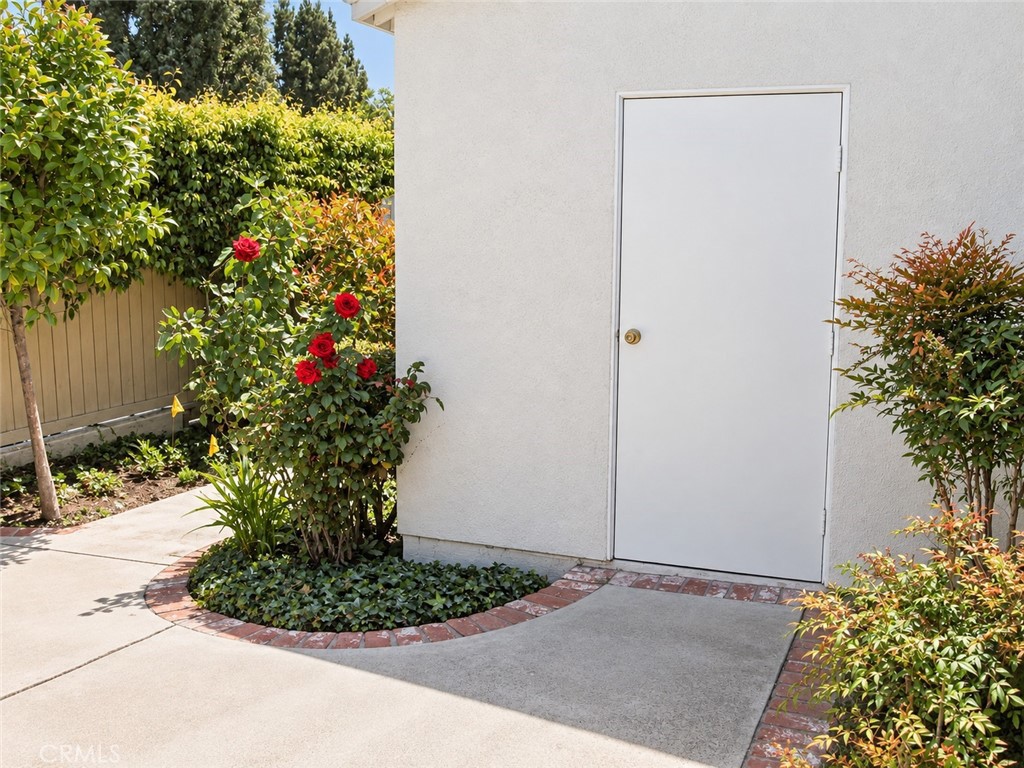 12 Spring Buck Irvine, CA 92614 - Photo 9 of 15 This door leads to the garage. It is attached to the house but no interior access
