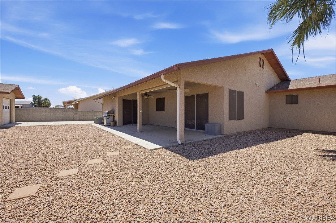 3918 North Eagle Rock Road Kingman, AZ 86409 - Photo 39 of 44 a front view of a house with a yard