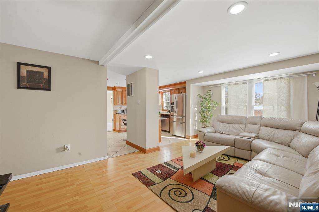 41 Woodland Road Bloomfield, NJ 07003 - Photo 11 of 27 a living room with furniture