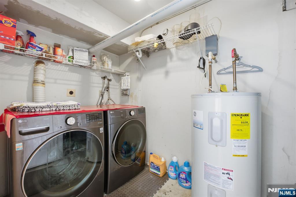 41 Woodland Road Bloomfield, NJ 07003 - Photo 26 of 27 a utility room with dryer and washer