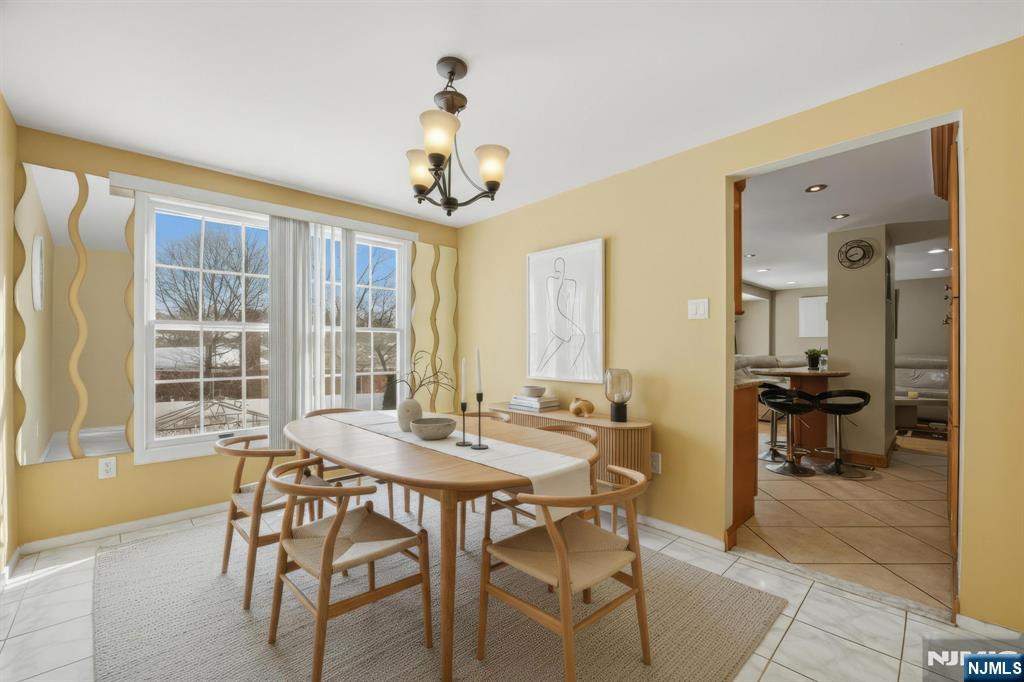 41 Woodland Road Bloomfield, NJ 07003 - Photo 10 of 27 a view of a dining room with furniture window and outside view