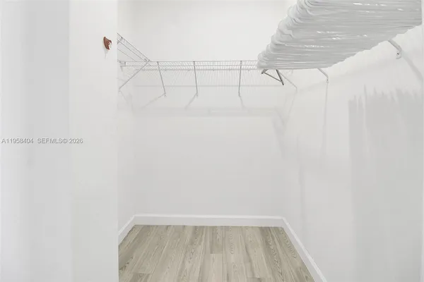 a view of a room with racks on the wall