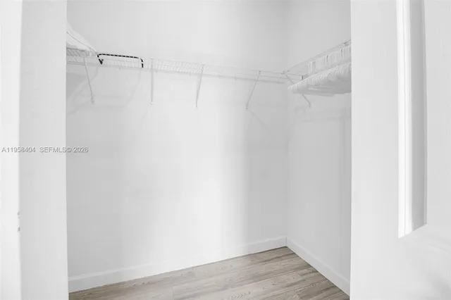 a view of an empty walk in closet