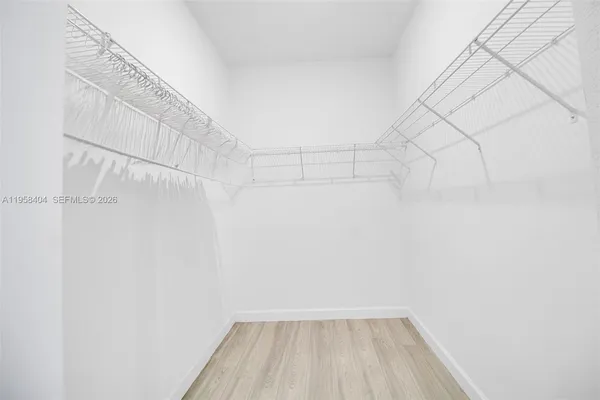 a view of a room with racks on the wall