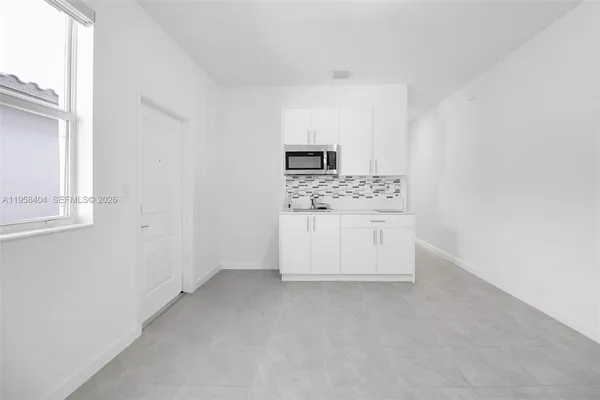a view of a storage & utility room in a house