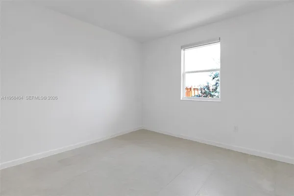 an empty room with a window