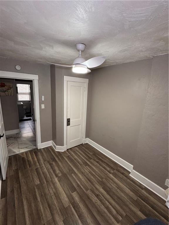 649 Singer Place Pittsburgh, PA 15221 - Photo 14 of 20 wooden floor in an empty room with a window