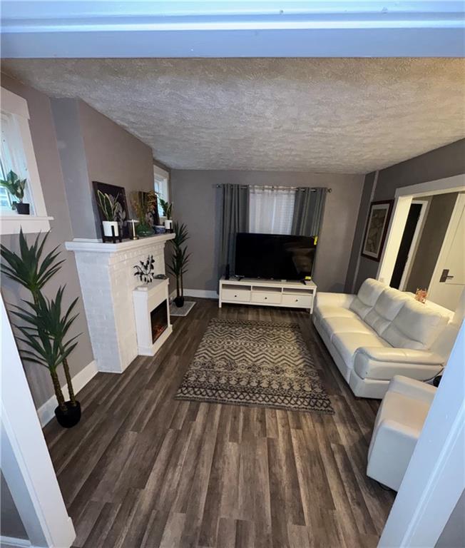 649 Singer Place Pittsburgh, PA 15221 - Photo 4 of 20 a living room with furniture and a couch