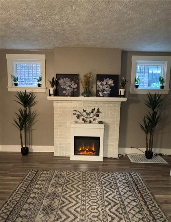 649 Singer Place Pittsburgh, PA 15221 - Photo 5 of 20 a living room with furniture and a fireplace
