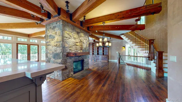 a view of porch with wooden floor and stairs