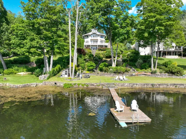 a view of swimming pool with a patio