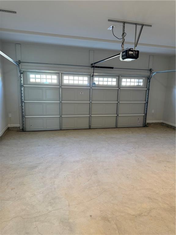 11067 Suria Drive Covington, GA 30014 - Photo 21 of 22 a view of an empty garage