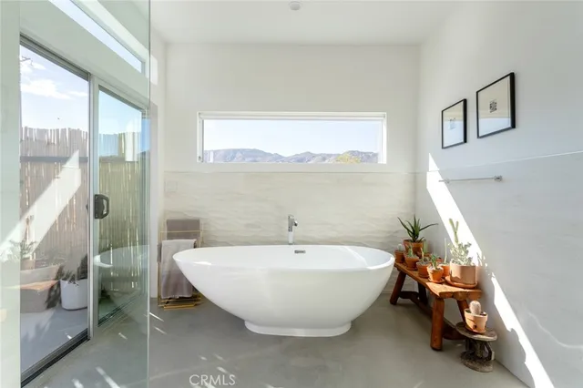 a bathroom with a shower and toilet