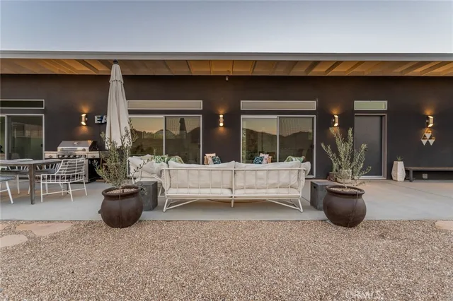 a view of a terrace with furniture