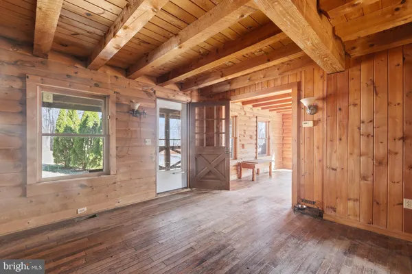 a view of entryway with wooden floor