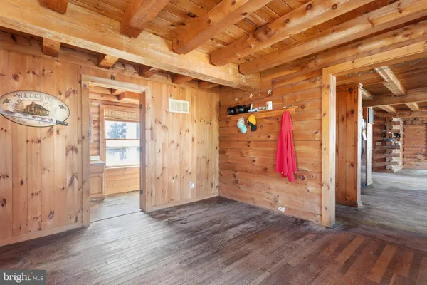 a bathroom with a sink a toilet and a shower