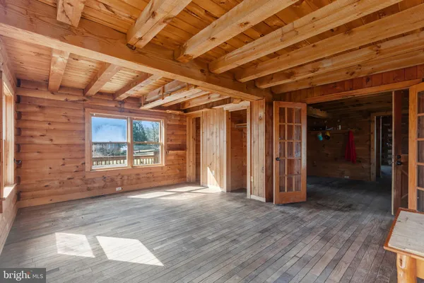 a view of entryway with wooden floor