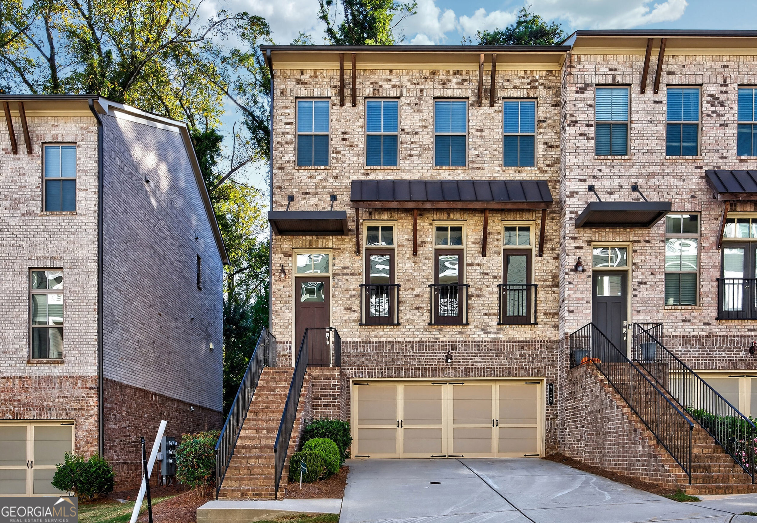 712 Avondale Hills Drive Decatur, GA 30032 - Photo 1 of 29 a front view of a building with glass windows