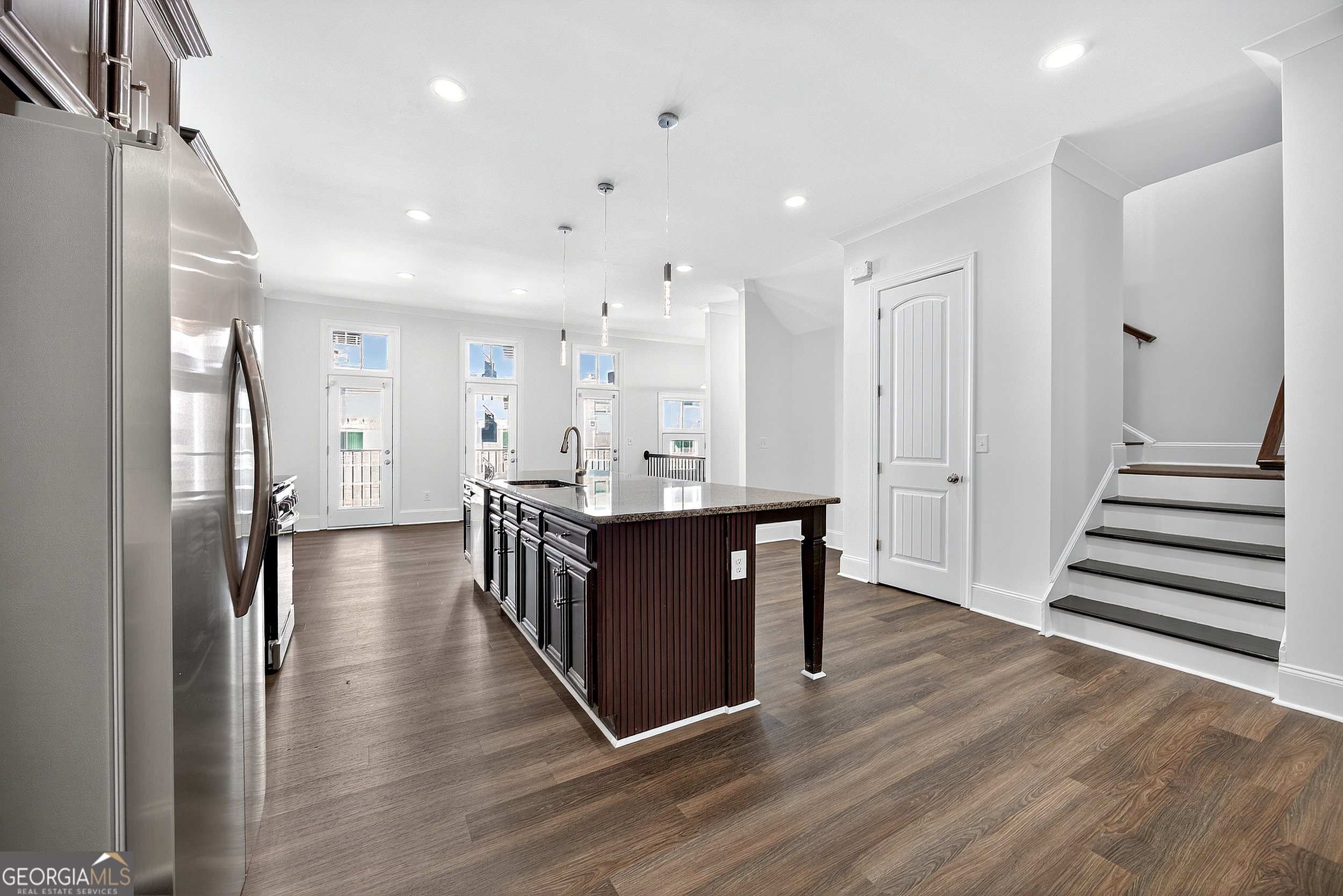 712 Avondale Hills Drive Decatur, GA 30032 - Photo 12 of 29 a kitchen with stainless steel appliances granite countertop a refrigerator a sink and a stove