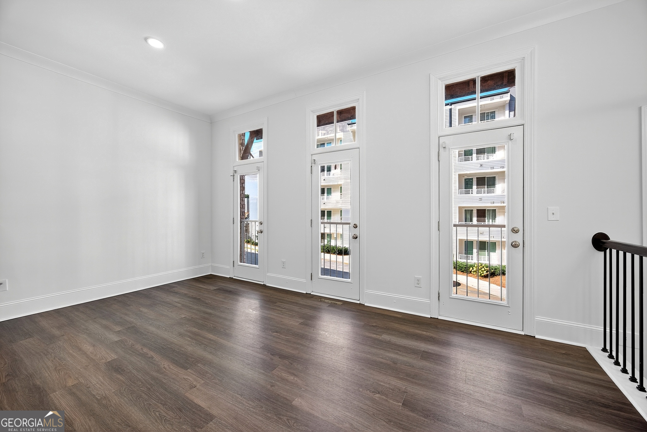 712 Avondale Hills Drive Decatur, GA 30032 - Photo 5 of 29 wooden floor in an empty room with a window