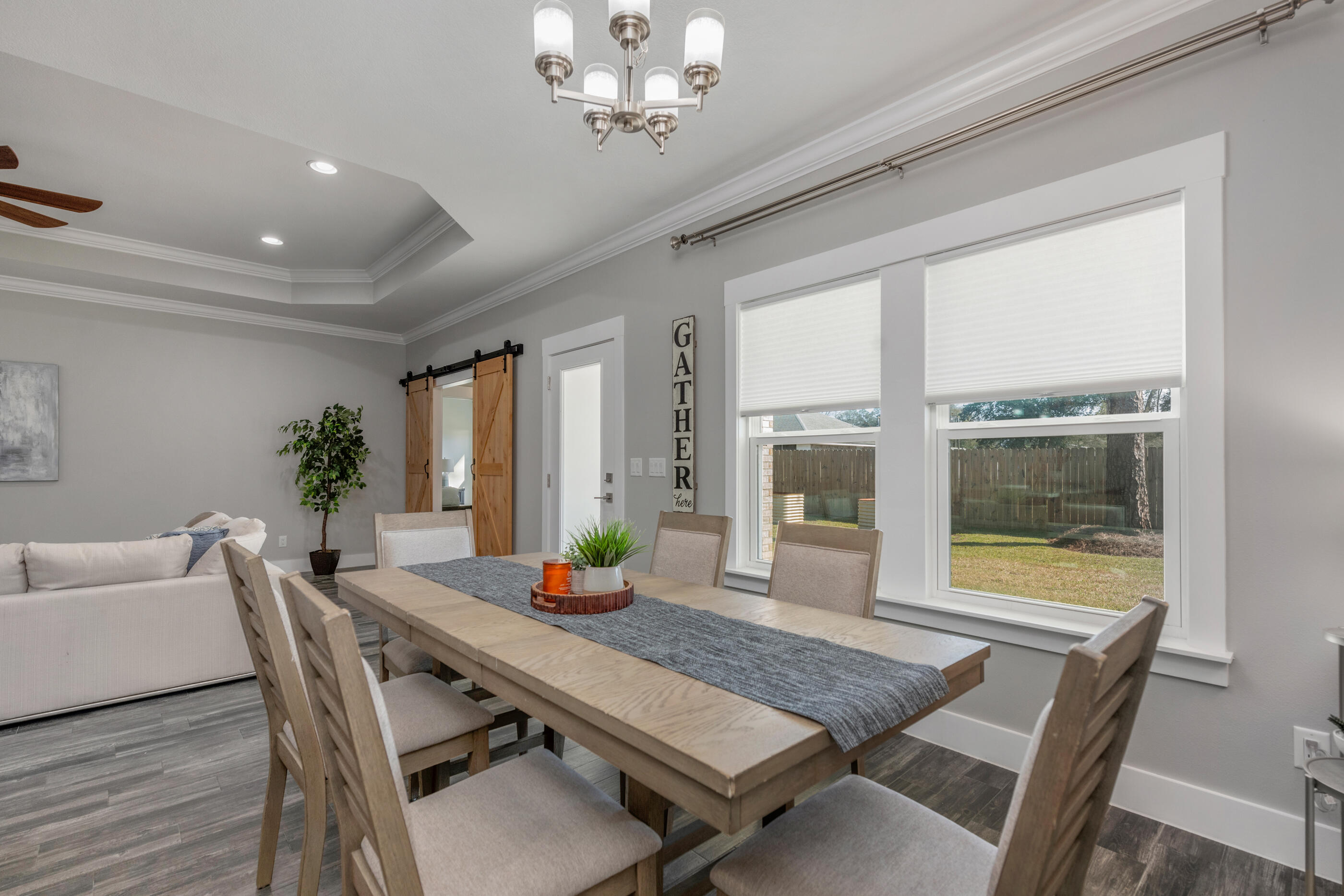1504 West Ponderosa Road Fort Walton Beach, FL 32547 - Photo 14 of 51 a view of a dining room with furniture window and outside view