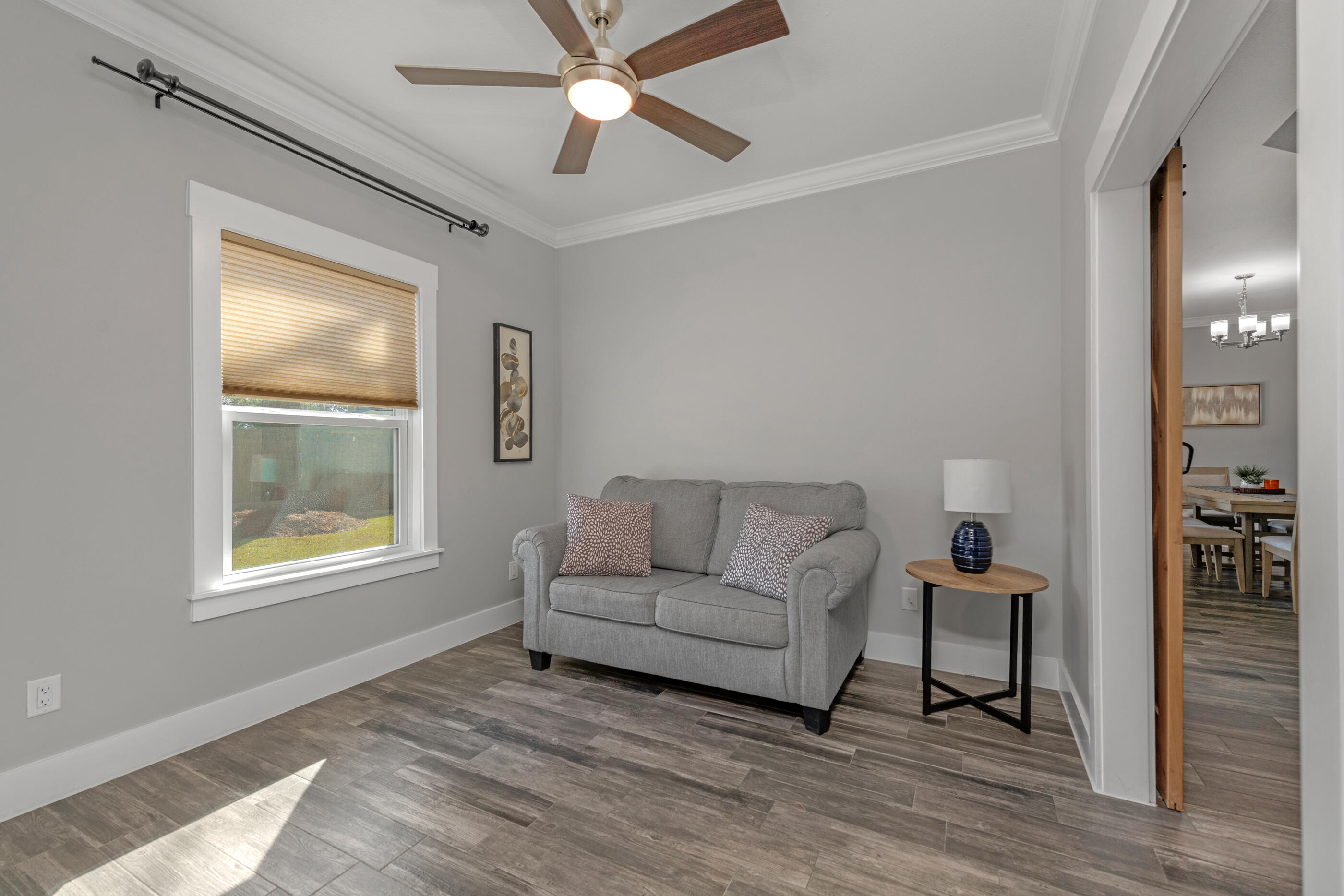 1504 West Ponderosa Road Fort Walton Beach, FL 32547 - Photo 24 of 51 a living room with furniture and a window
