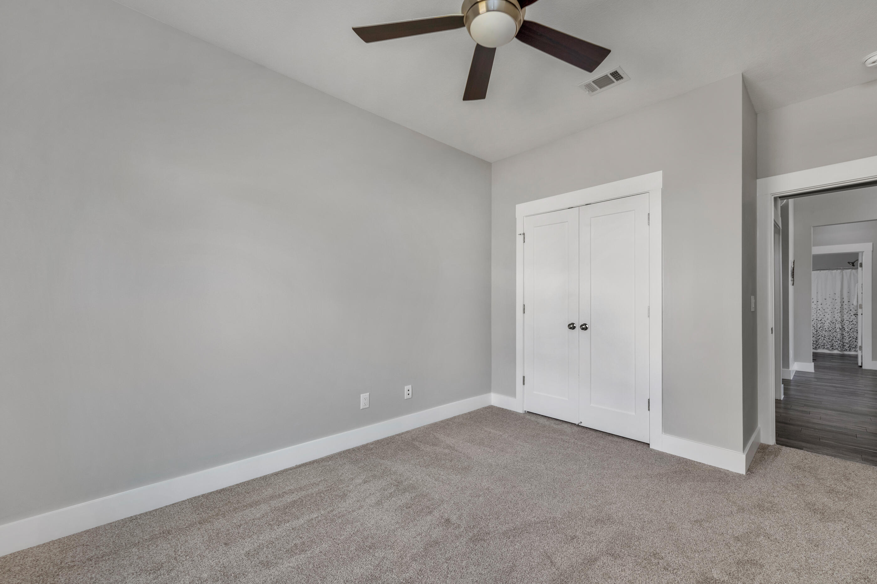 1504 West Ponderosa Road Fort Walton Beach, FL 32547 - Photo 43 of 51 an empty room with a window and a fan