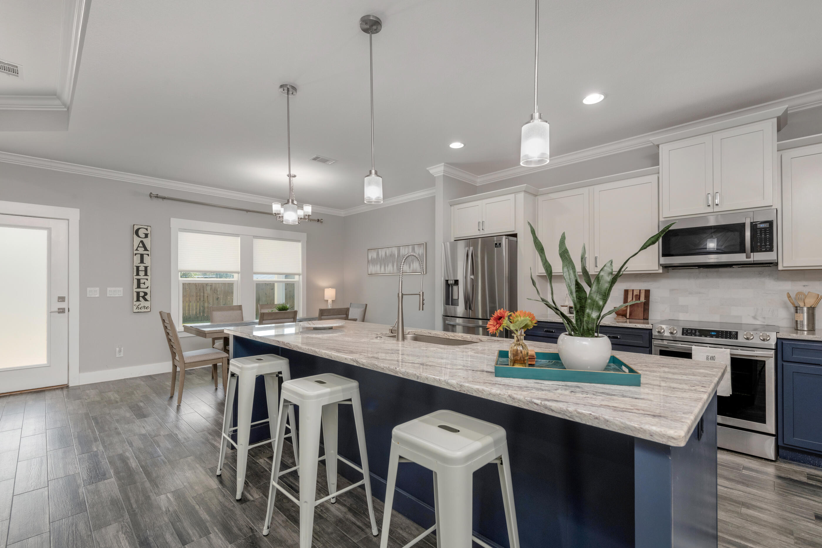 1504 West Ponderosa Road Fort Walton Beach, FL 32547 - Photo 5 of 51 a kitchen with a table and chairs in it