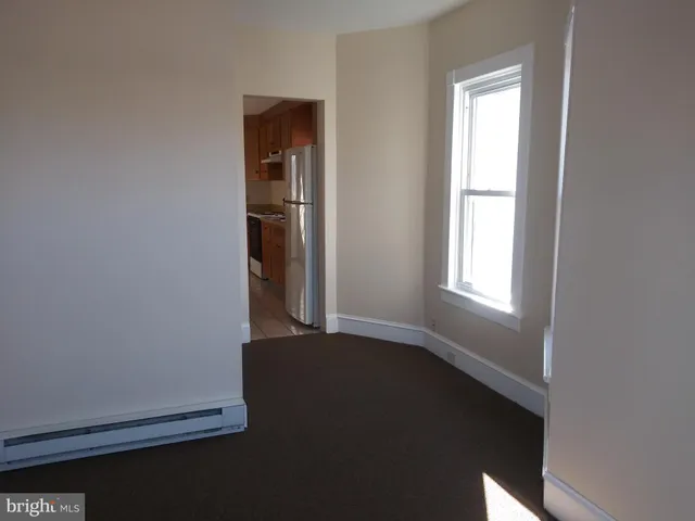 an empty room with a door