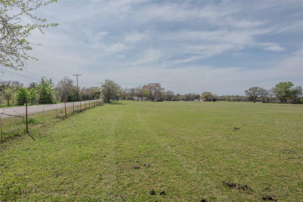 924 Fox Lane Azle, TX 76020 - Photo 2 of 8 Expansive green acreage with a perimeter fence