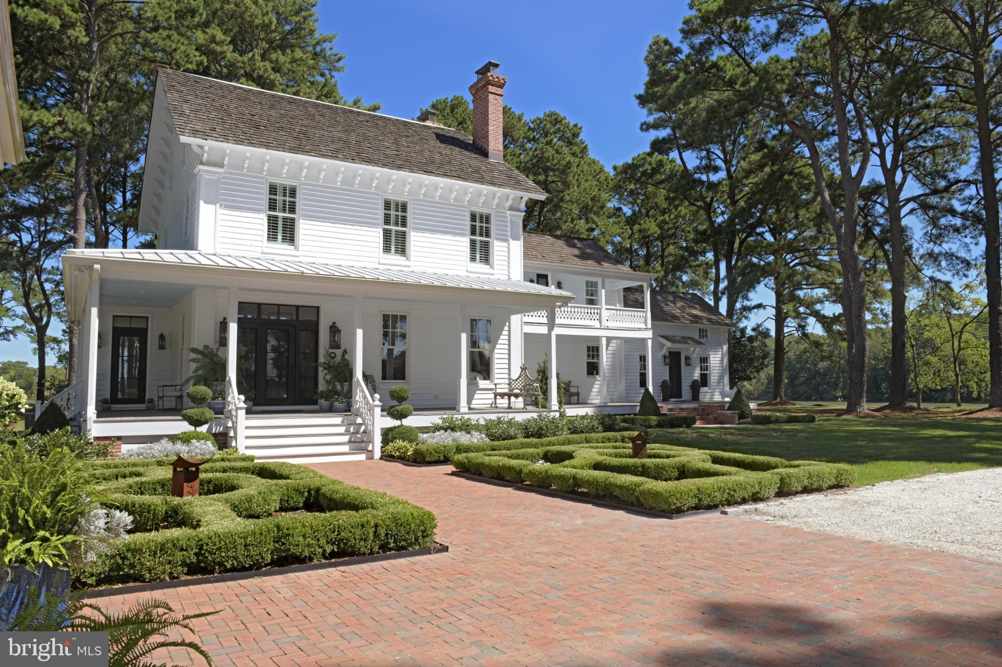20031 Oakland Farm Road Cape Charles, VA 23310 - Photo 13 of 98 Charming white home with lush gardens.