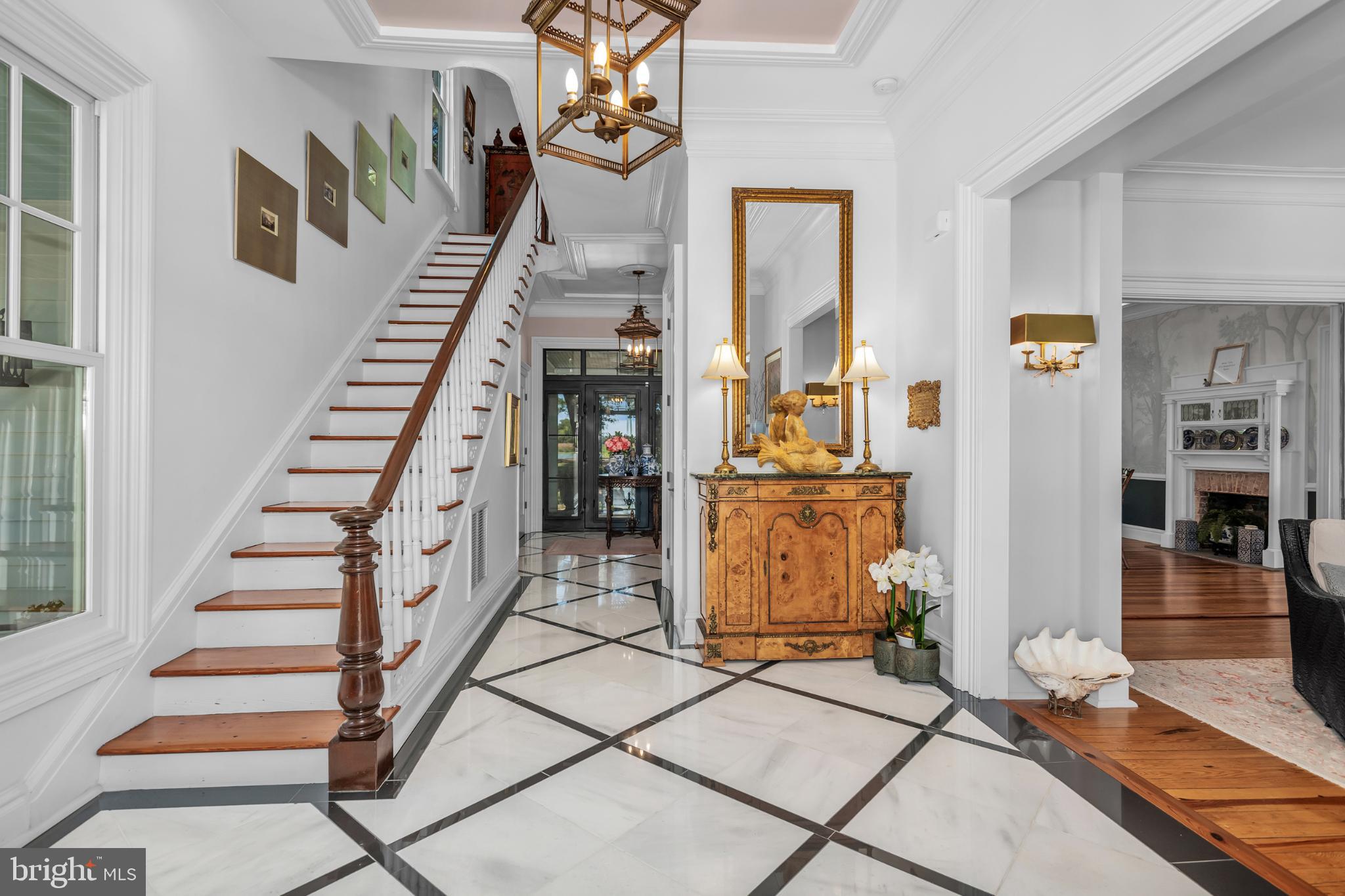 20031 Oakland Farm Road Cape Charles, VA 23310 - Photo 18 of 98 Elegant foyer with marble floor/classic staircase