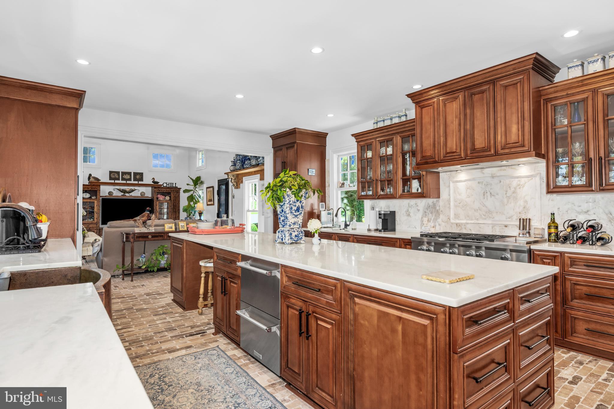20031 Oakland Farm Road Cape Charles, VA 23310 - Photo 27 of 98 Elegant kitchen with rich maple wood cabinetry
