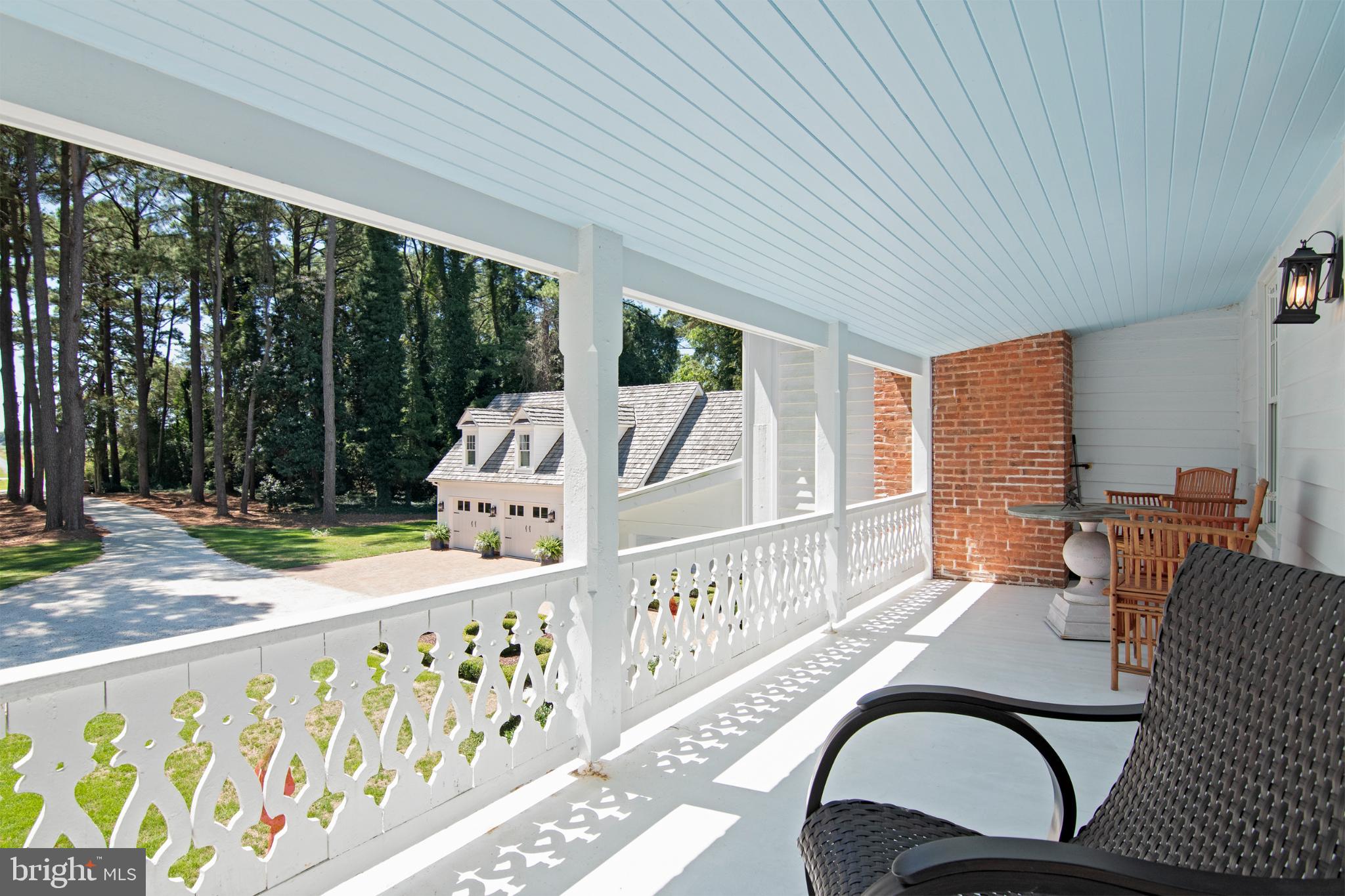 20031 Oakland Farm Road Cape Charles, VA 23310 - Photo 33 of 98 Charming porch with serene woodland views
