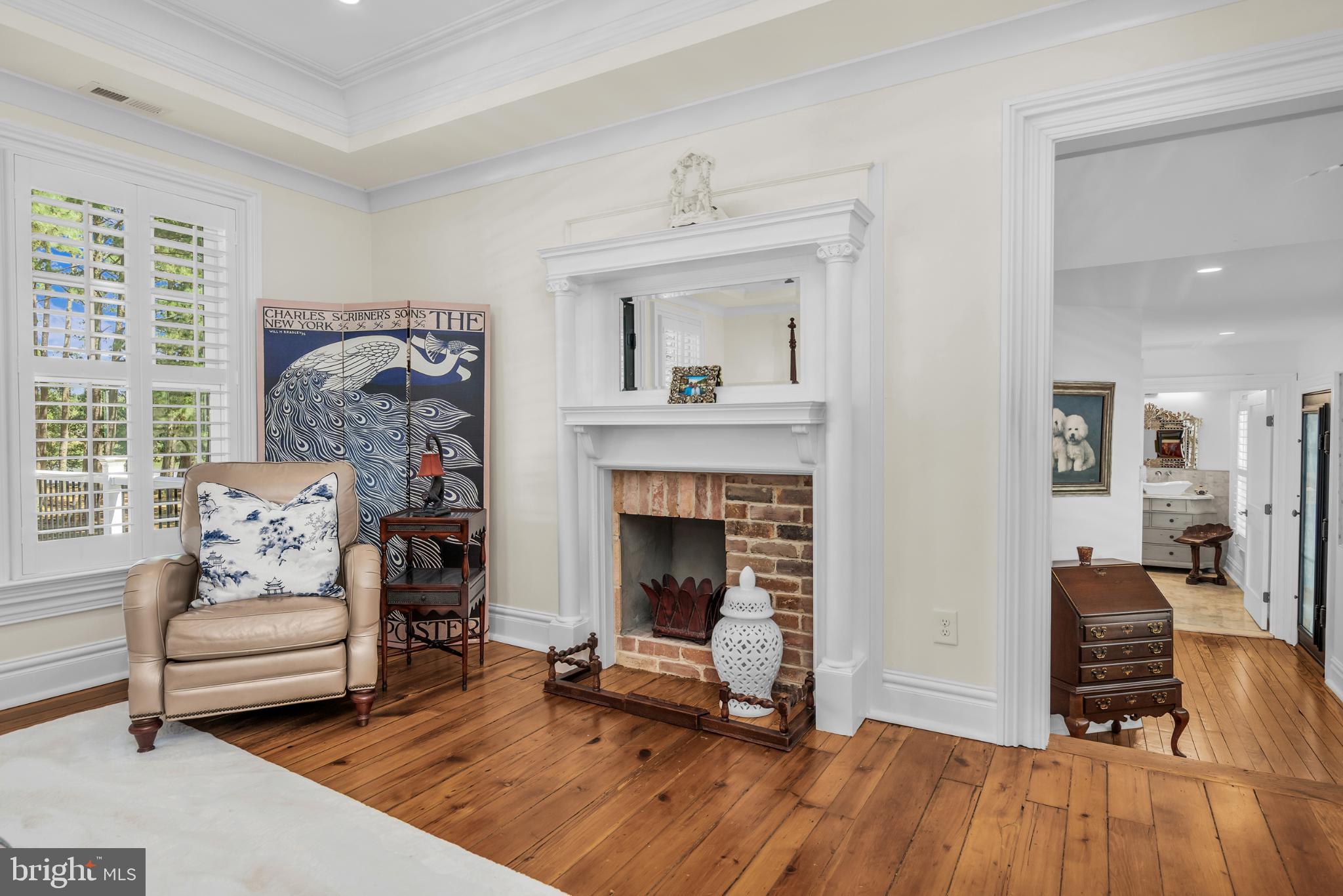 20031 Oakland Farm Road Cape Charles, VA 23310 - Photo 38 of 98 Primary Bedroom with gas fireplace/water views