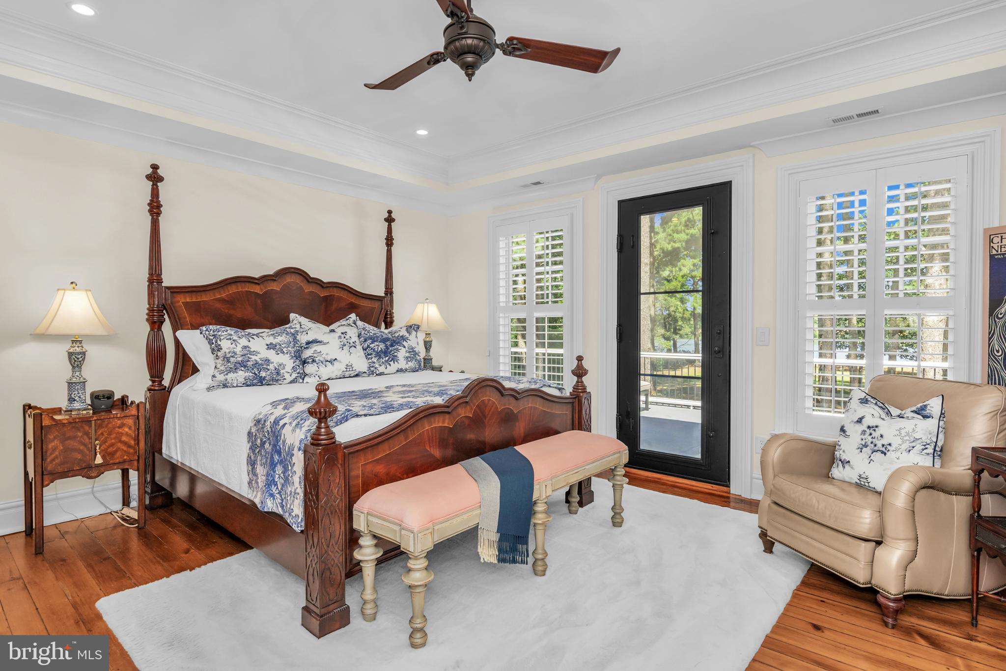 20031 Oakland Farm Road Cape Charles, VA 23310 - Photo 39 of 98 Light filled primary bedroom with door to balcony