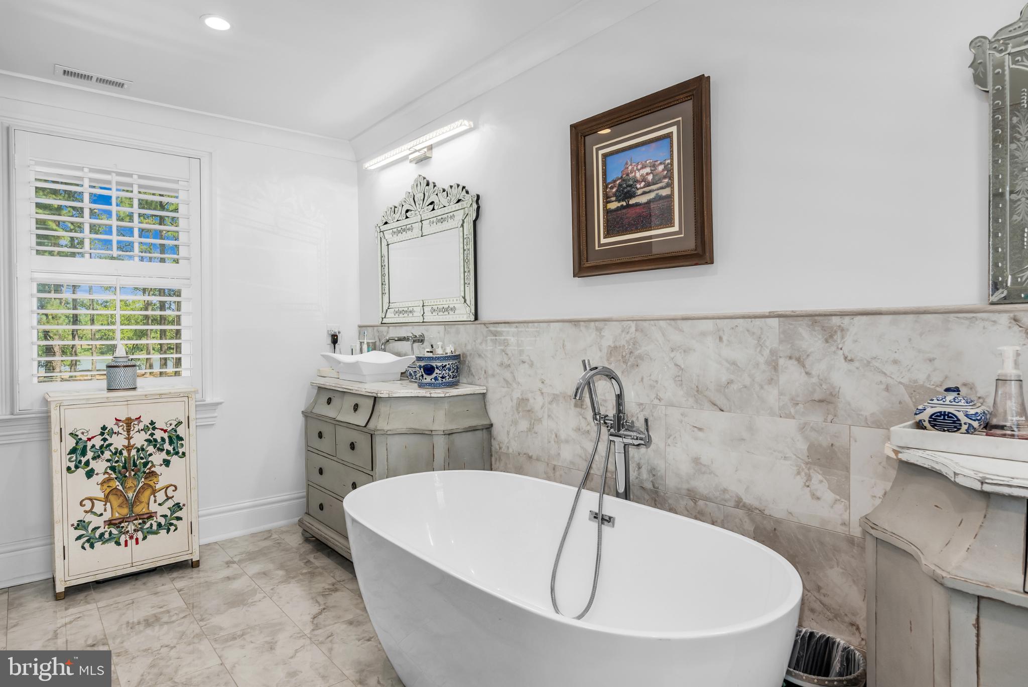 20031 Oakland Farm Road Cape Charles, VA 23310 - Photo 42 of 98 Elegant primary bathroom with modern touches
