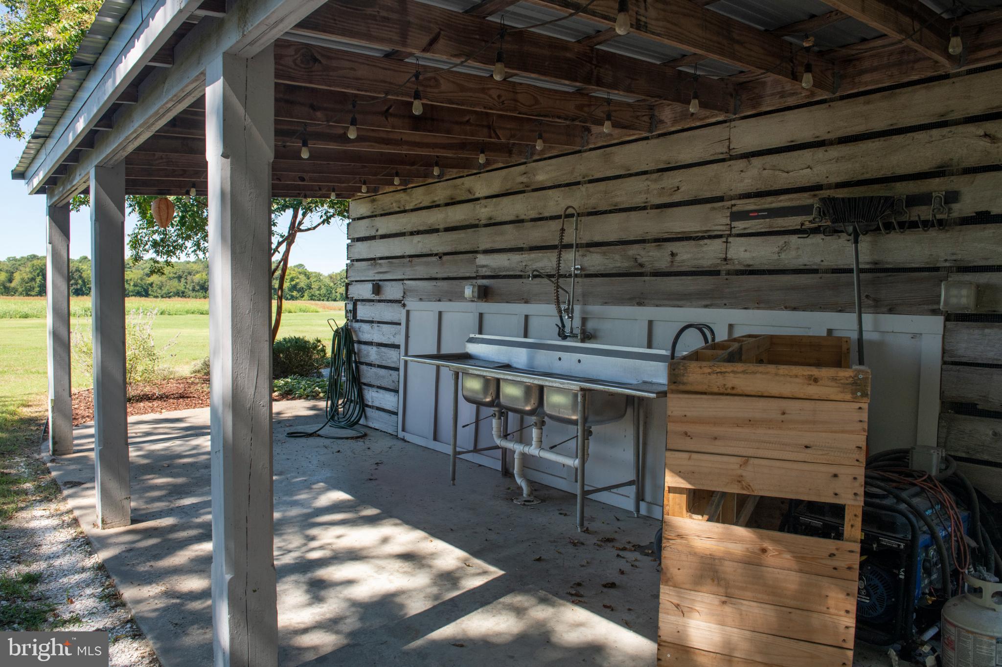 20031 Oakland Farm Road Cape Charles, VA 23310 - Photo 82 of 98 Mimosa Barn corn crib converted for catering prep