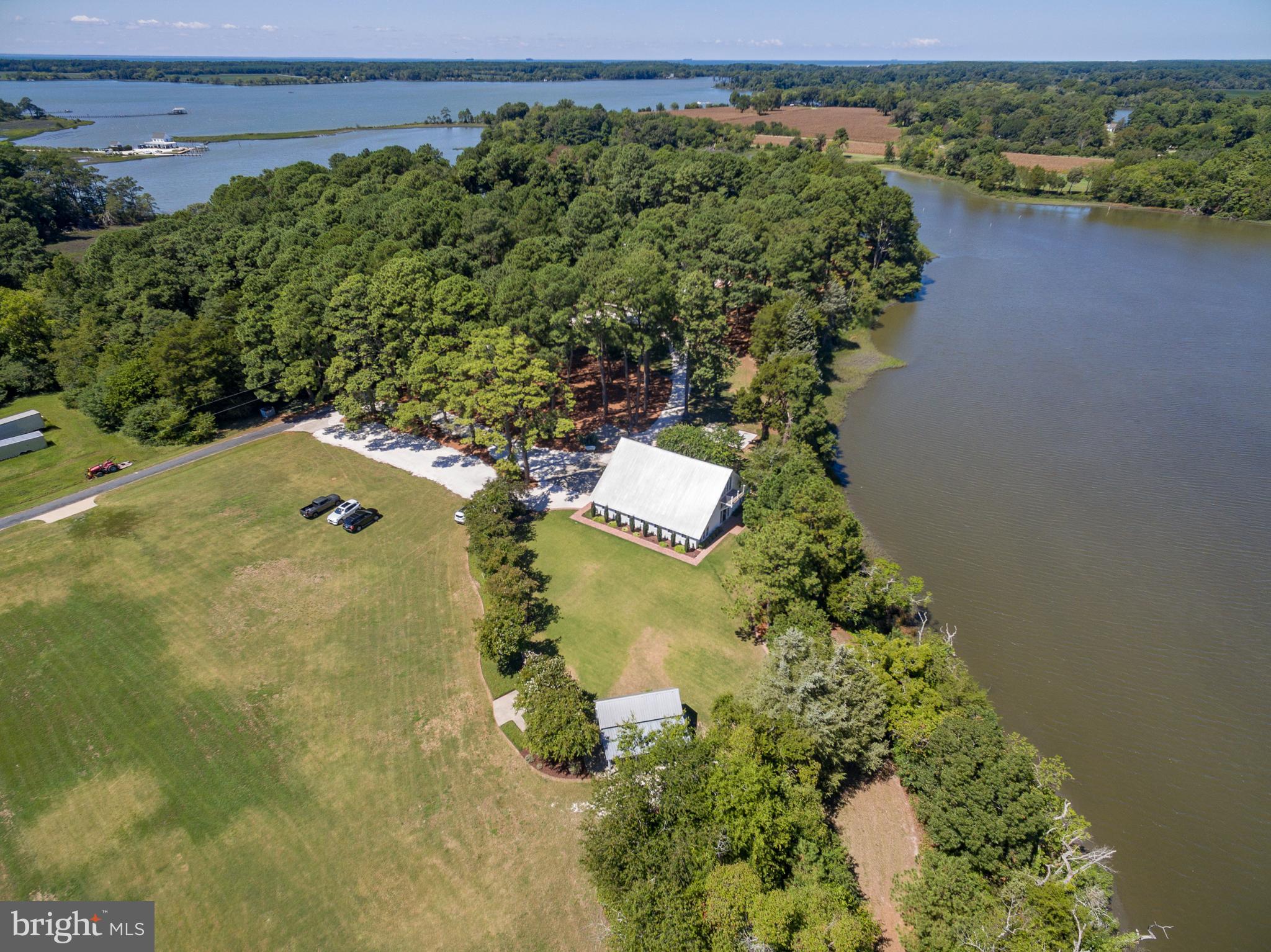 20031 Oakland Farm Road Cape Charles, VA 23310 - Photo 92 of 98 Serene lakeside retreat surrounded by nature.