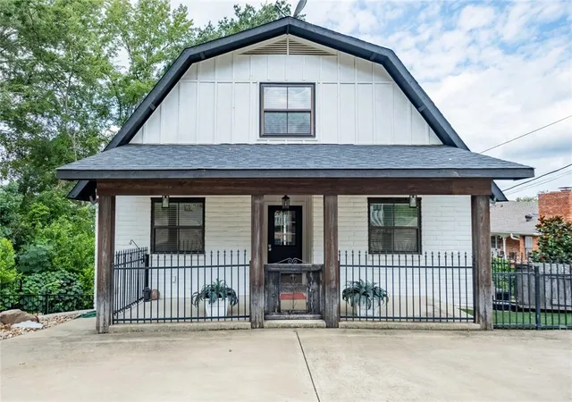 a front view of a house with balcony
