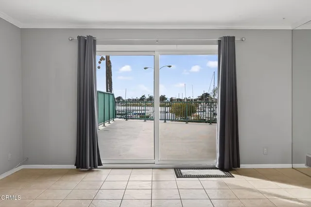 a kitchen with granite countertop a sink and cabinets