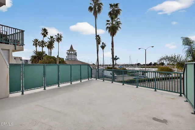 a view of a balcony with a garden