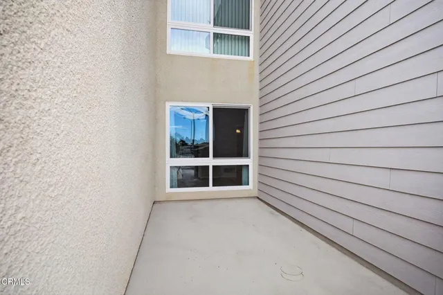 a view of a kitchen with electric appliances